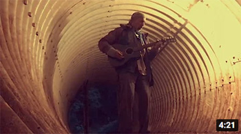 arnaz playing guitar